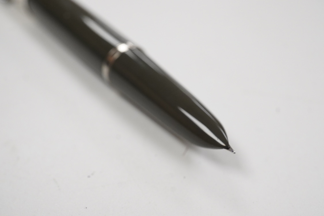 A rare Parker 41 fountain pen with grey body and white fishscale cap